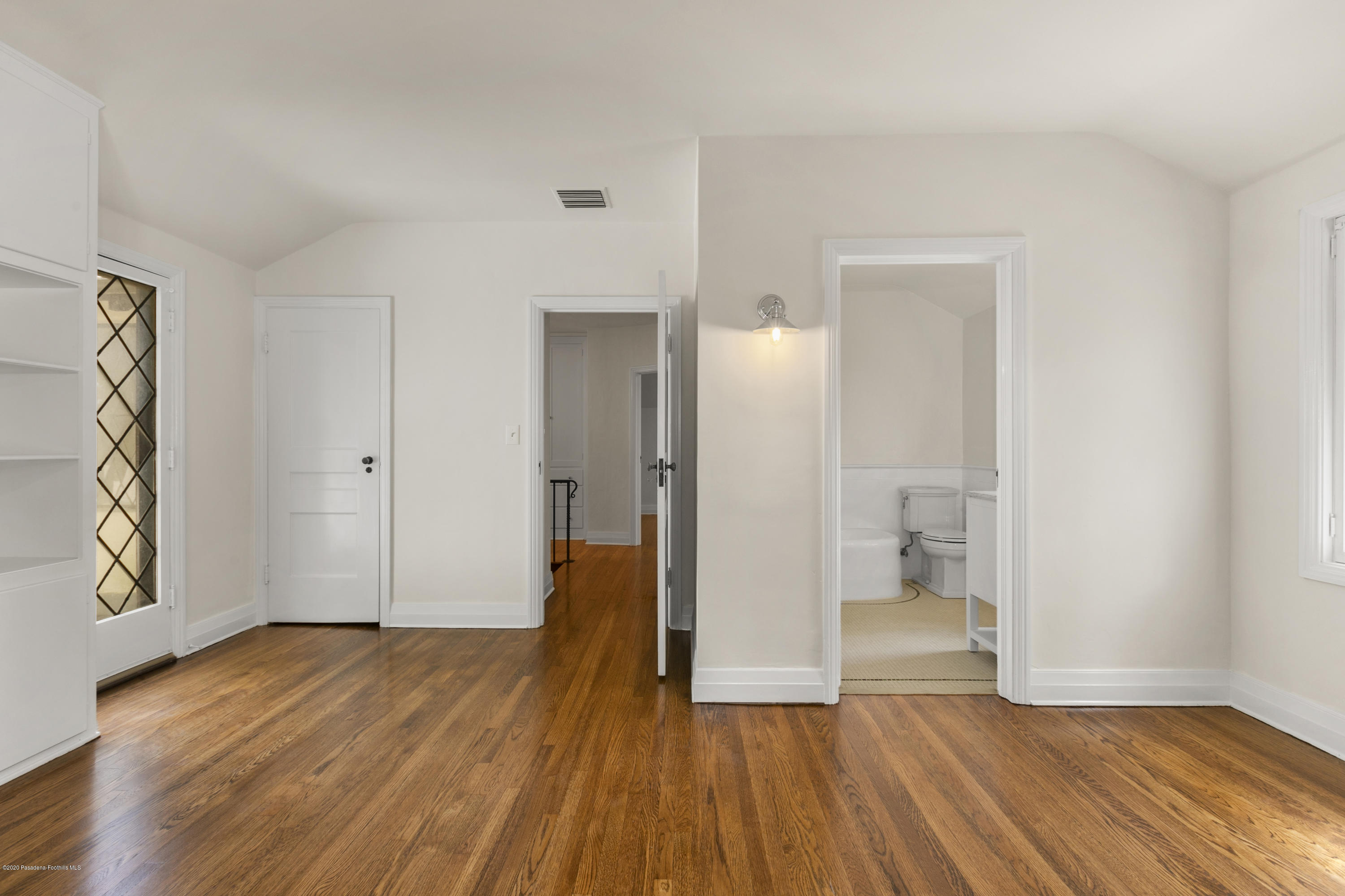 1701 East Altadena Drive Altadena, CA 91001 - Photo 22 of 36 a view of a room with wooden floor and bathroom