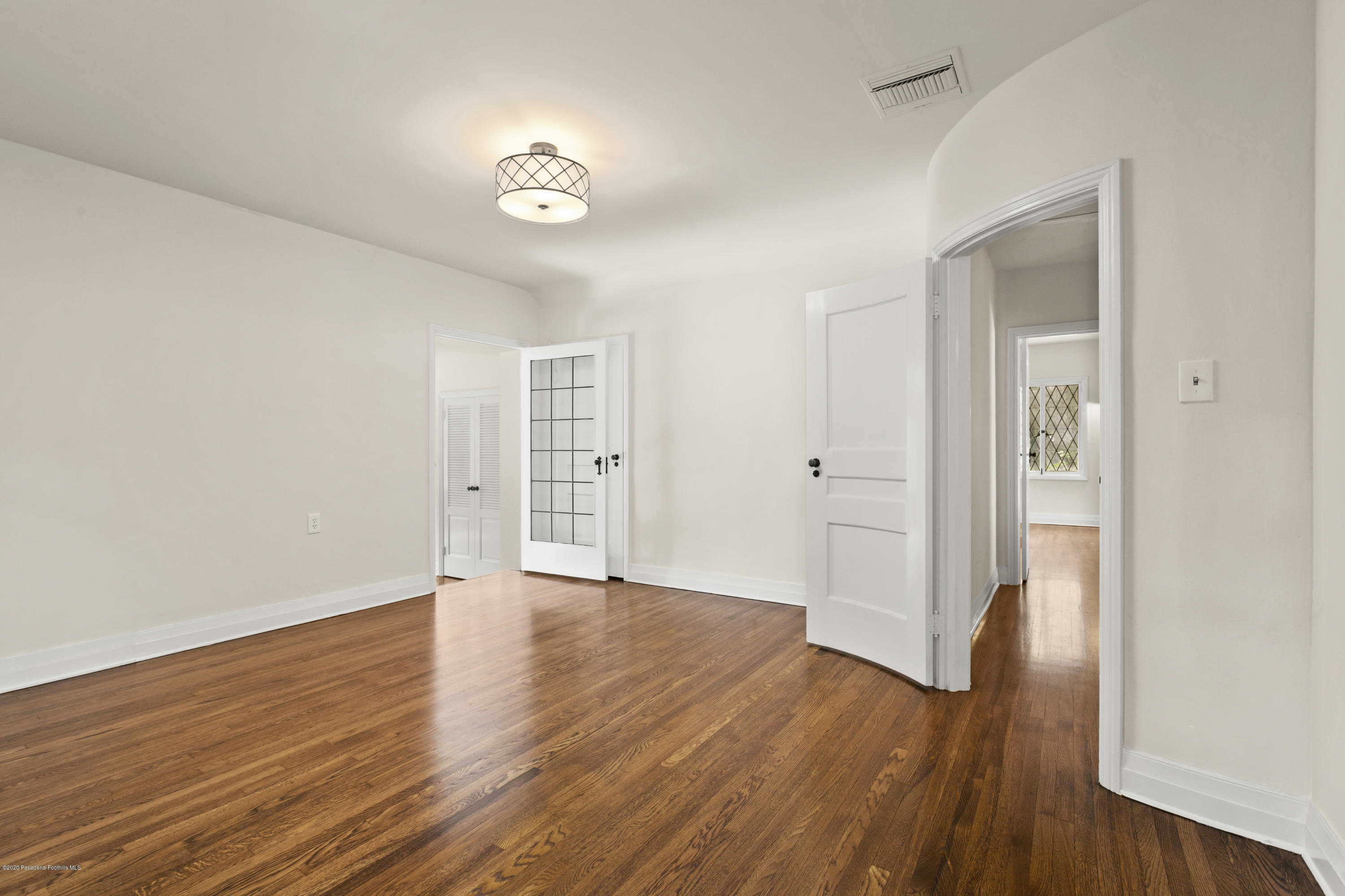 1701 East Altadena Drive Altadena, CA 91001 - Photo 26 of 36 a view of an empty room with wooden floor