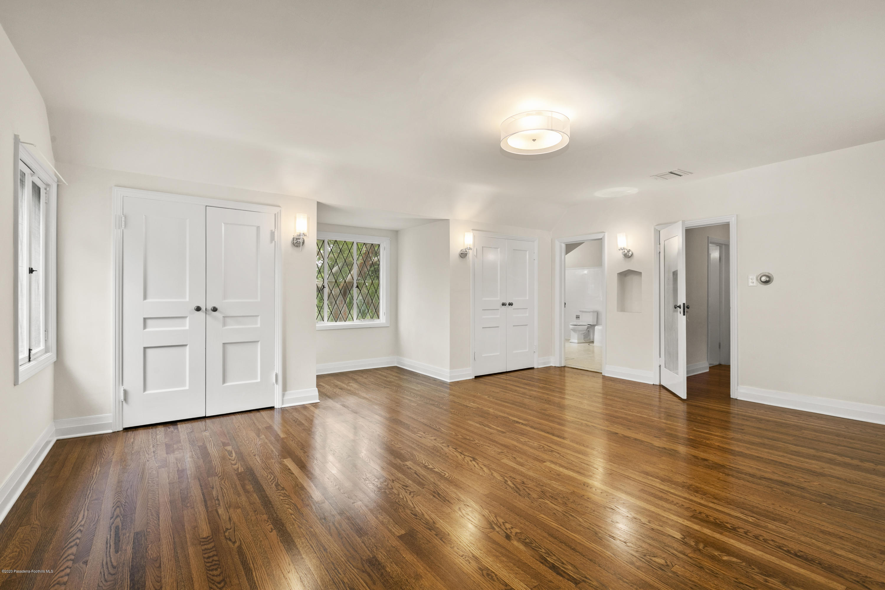 1701 East Altadena Drive Altadena, CA 91001 - Photo 33 of 36 a view of empty room with wooden floor and window