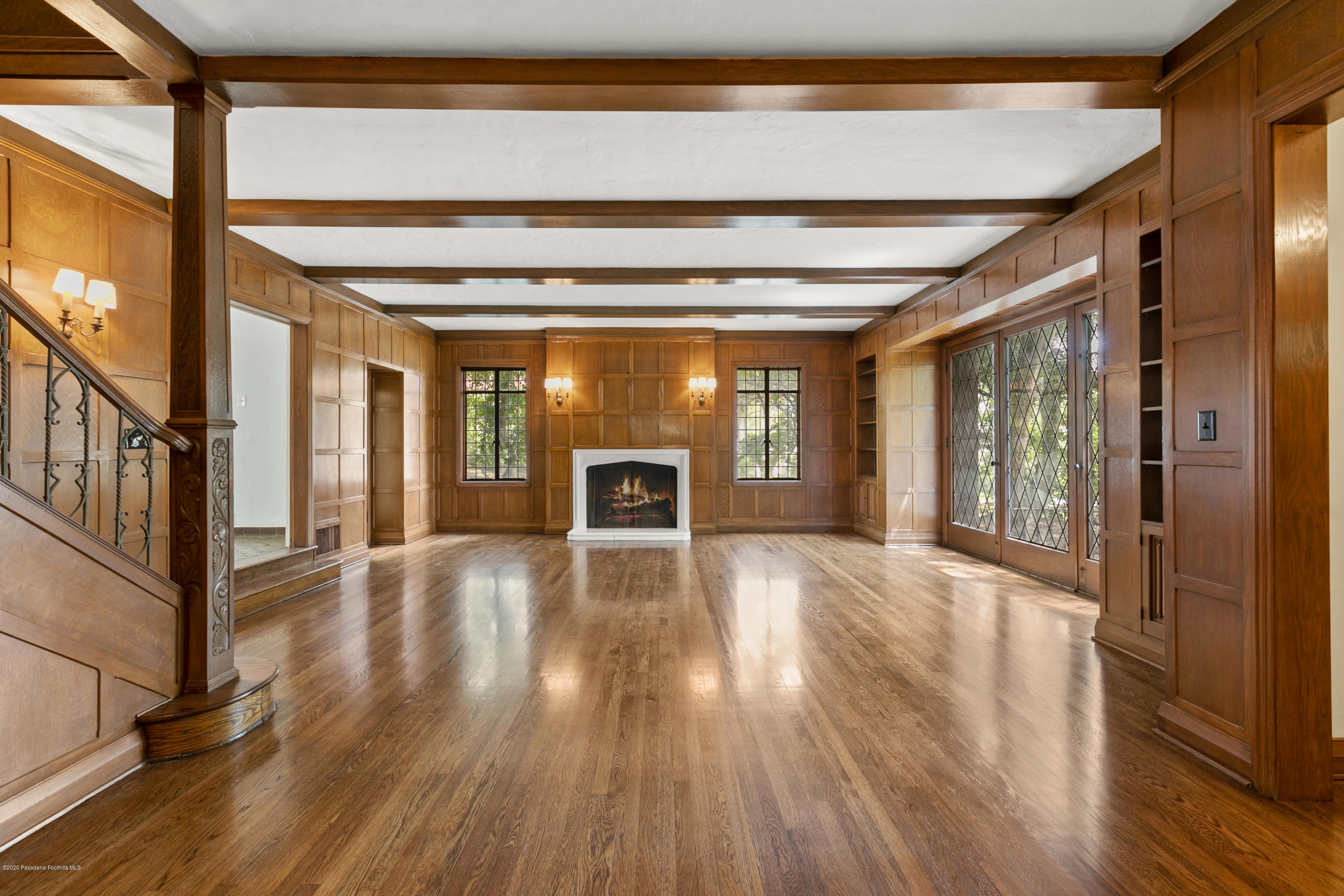 1701 East Altadena Drive Altadena, CA 91001 - Photo 5 of 36 a view of an empty room with wooden floor and a window