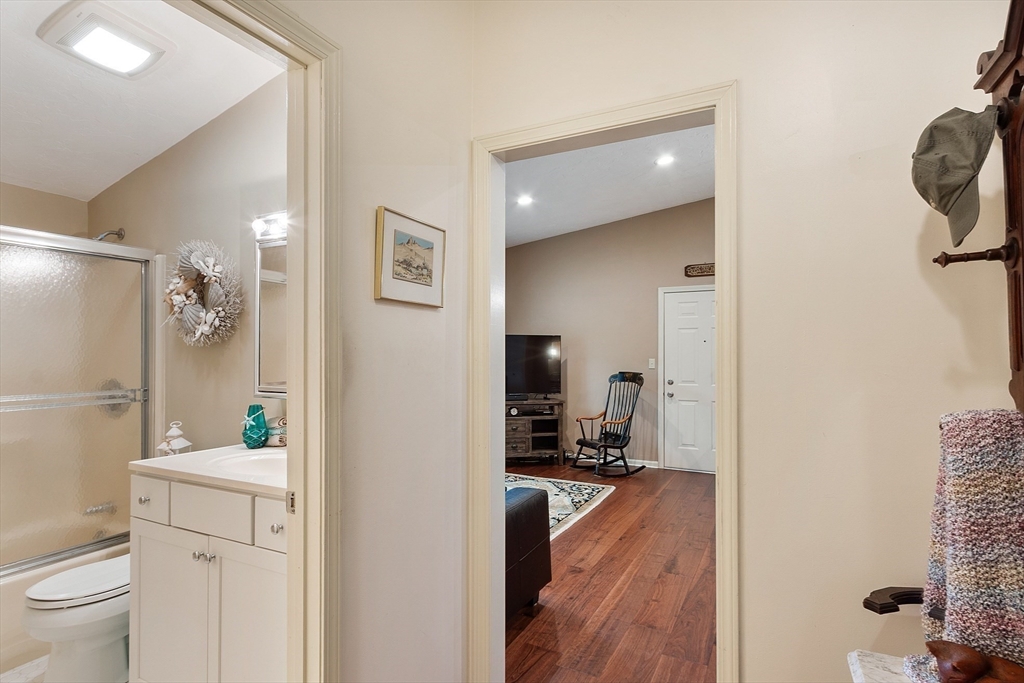 425 Main Street, Unit 8B Hudson, MA 01749 - Photo 22 of 31 a bathroom with a sink toilet and shower