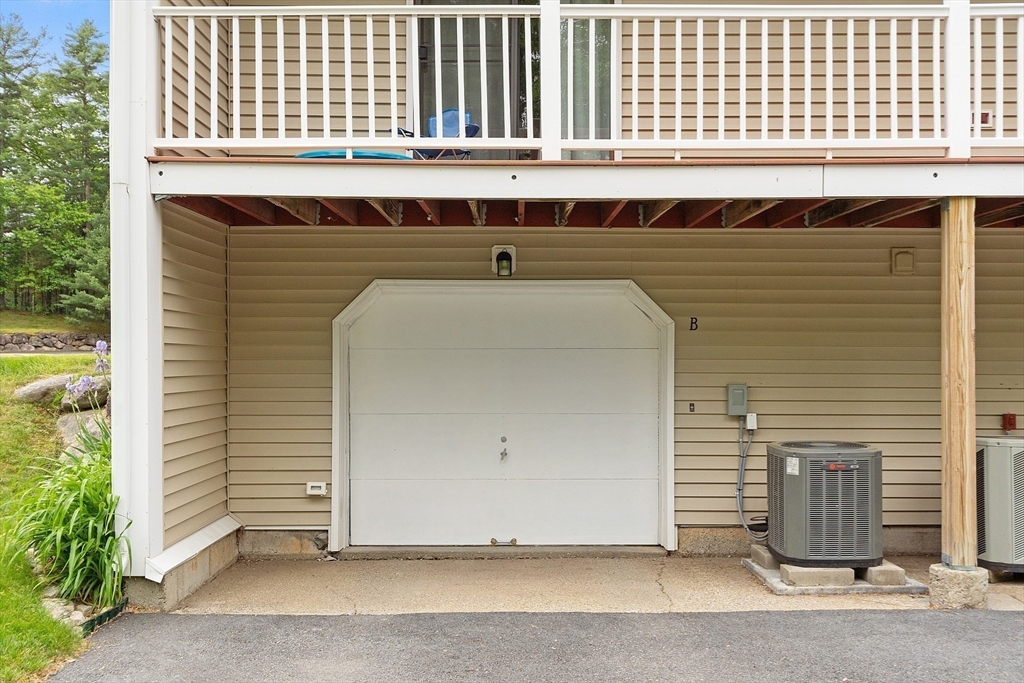 425 Main Street, Unit 8B Hudson, MA 01749 - Photo 28 of 31 a view of front door of house