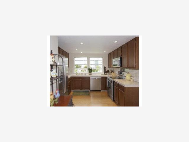 13 Merion Road Half Moon Bay, CA 94019 - Photo 2 of 9 a kitchen with a sink and a refrigerator