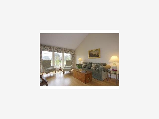 13 Merion Road Half Moon Bay, CA 94019 - Photo 4 of 9 a living room with furniture and a flat screen tv