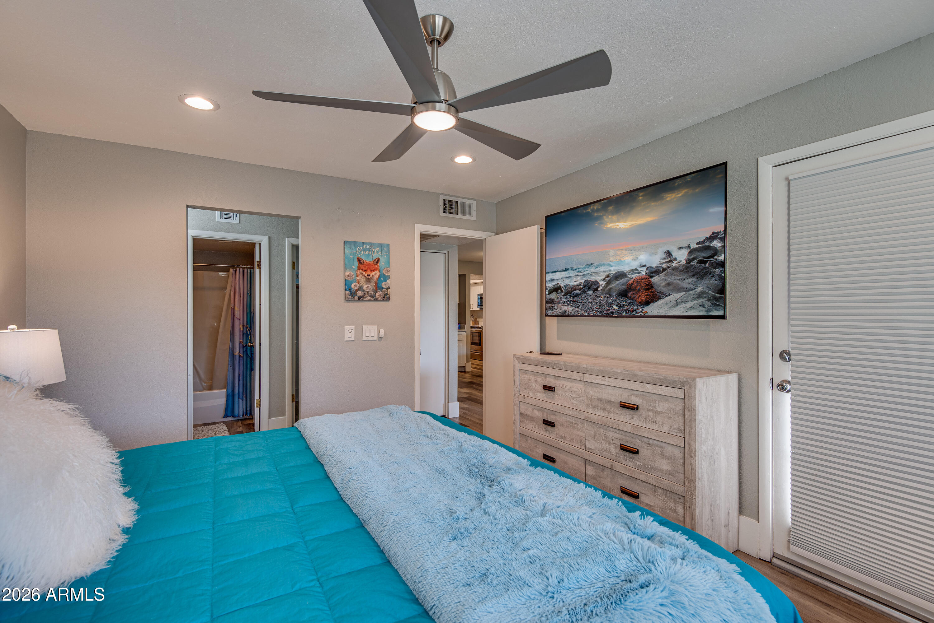 4150 East Cactus Road, Unit 108 Phoenix, AZ 85032 - Photo 13 of 31 4150Cactus-king bedrrom from bed