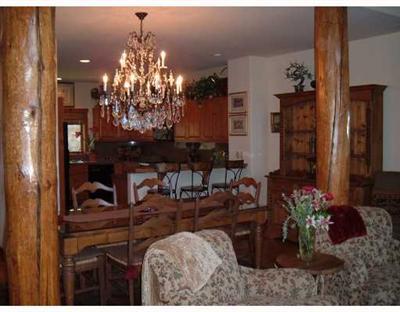 152 Knudson Ranch Road, Unit 152 Edwards, CO 81632 - Photo 5 of 6 a view of a dining room with furniture