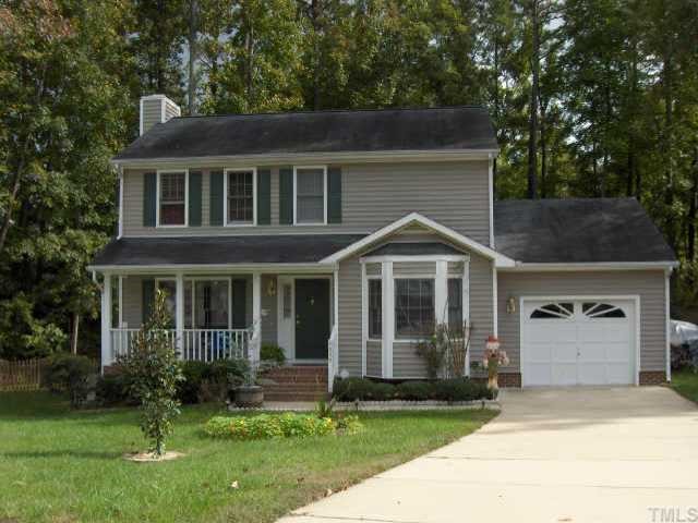 4809 Gun Powder Place Raleigh, NC 27616 - Photo 1 of 1 a front view of a house with a yard and garage
