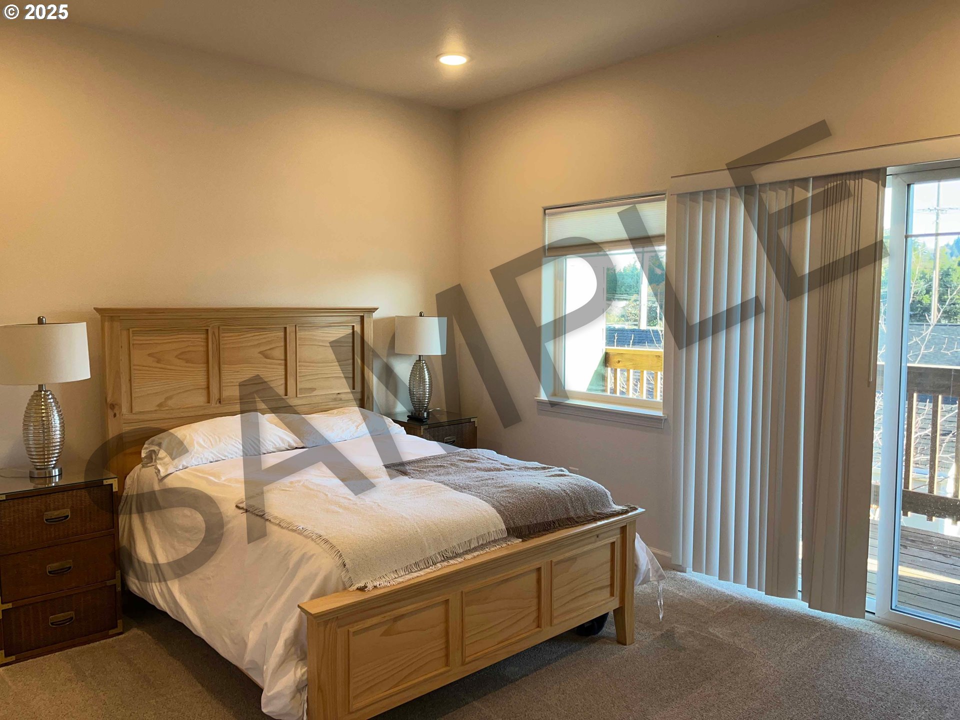 1577 37th Street Florence, OR 97439 - Photo 18 of 48 a bedroom with a bed and a window