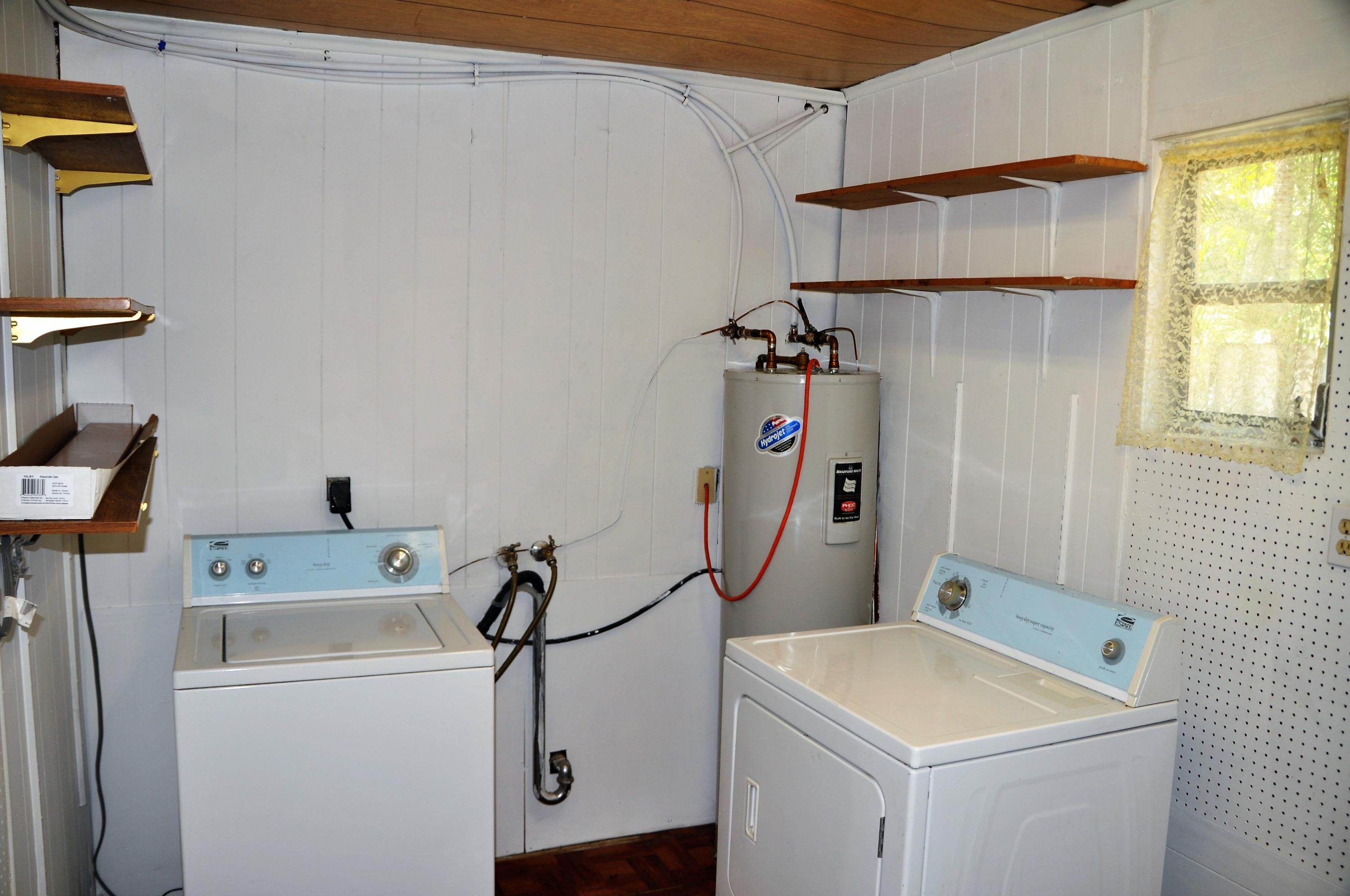 3025 Robert Road West Palm Beach, FL 33405 - Photo 19 of 41 a utility room with dryer and washer