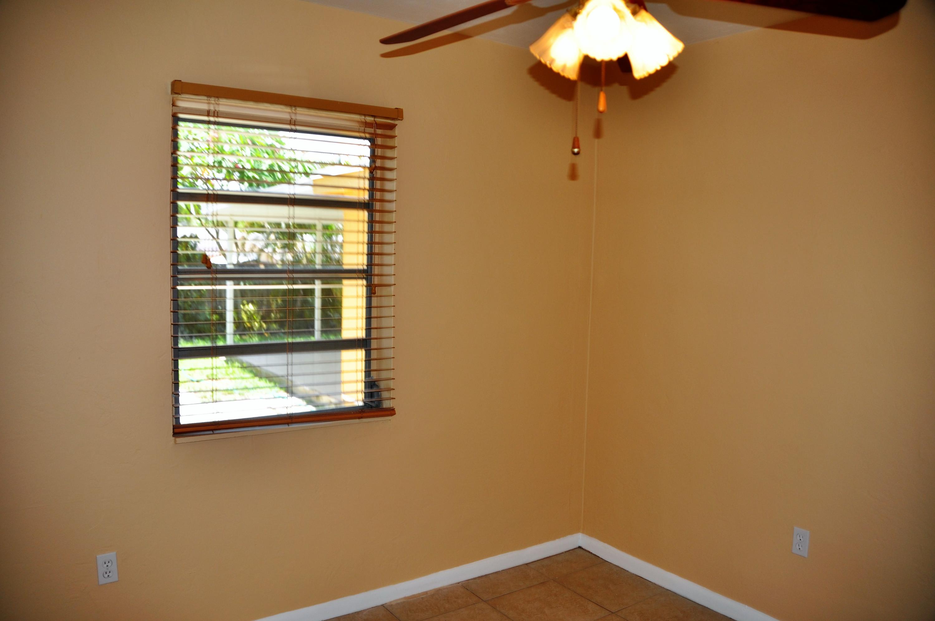 3025 Robert Road West Palm Beach, FL 33405 - Photo 28 of 41 a view of an empty room with a window