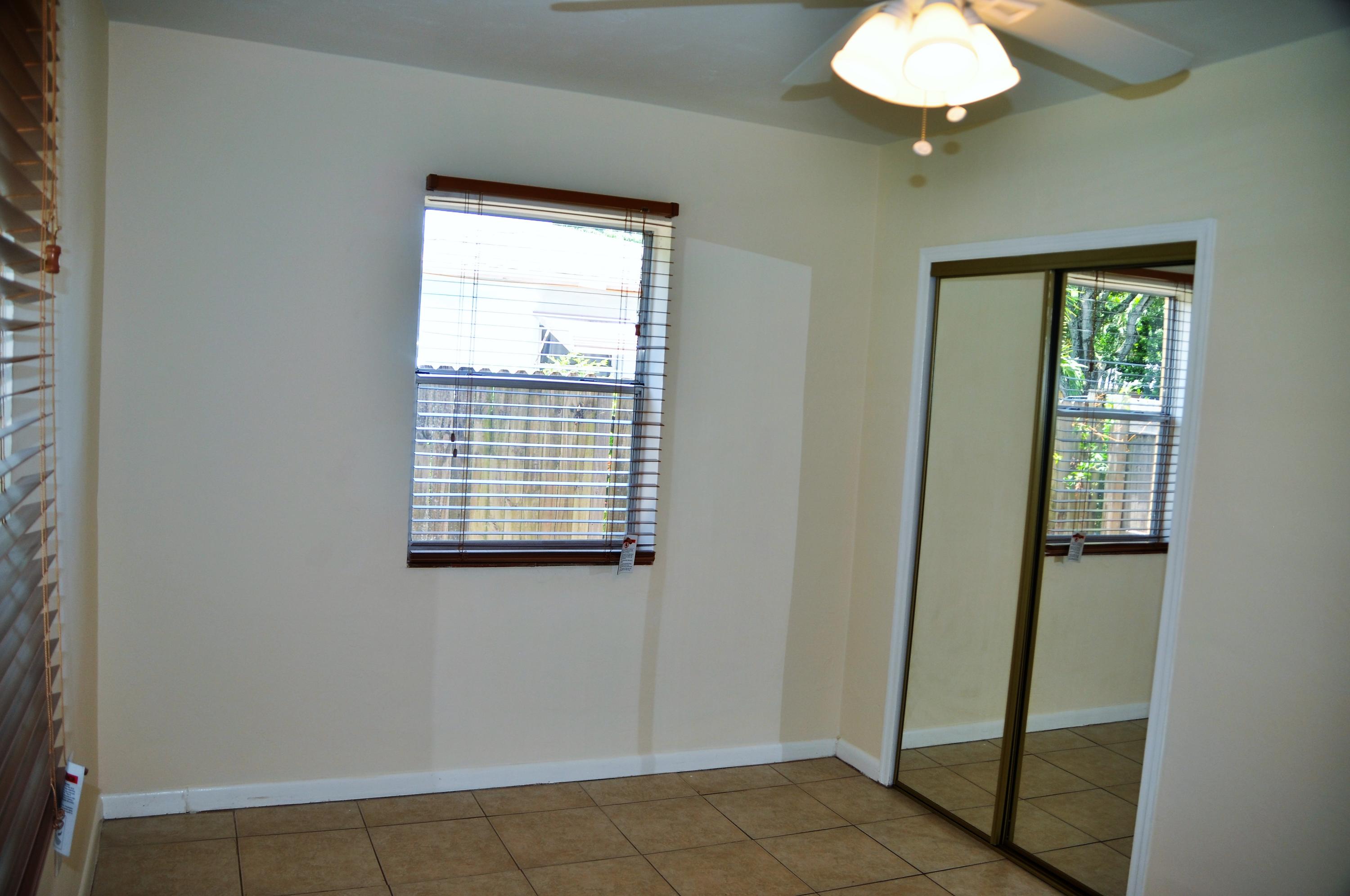 3025 Robert Road West Palm Beach, FL 33405 - Photo 31 of 41 a view of an empty room with window