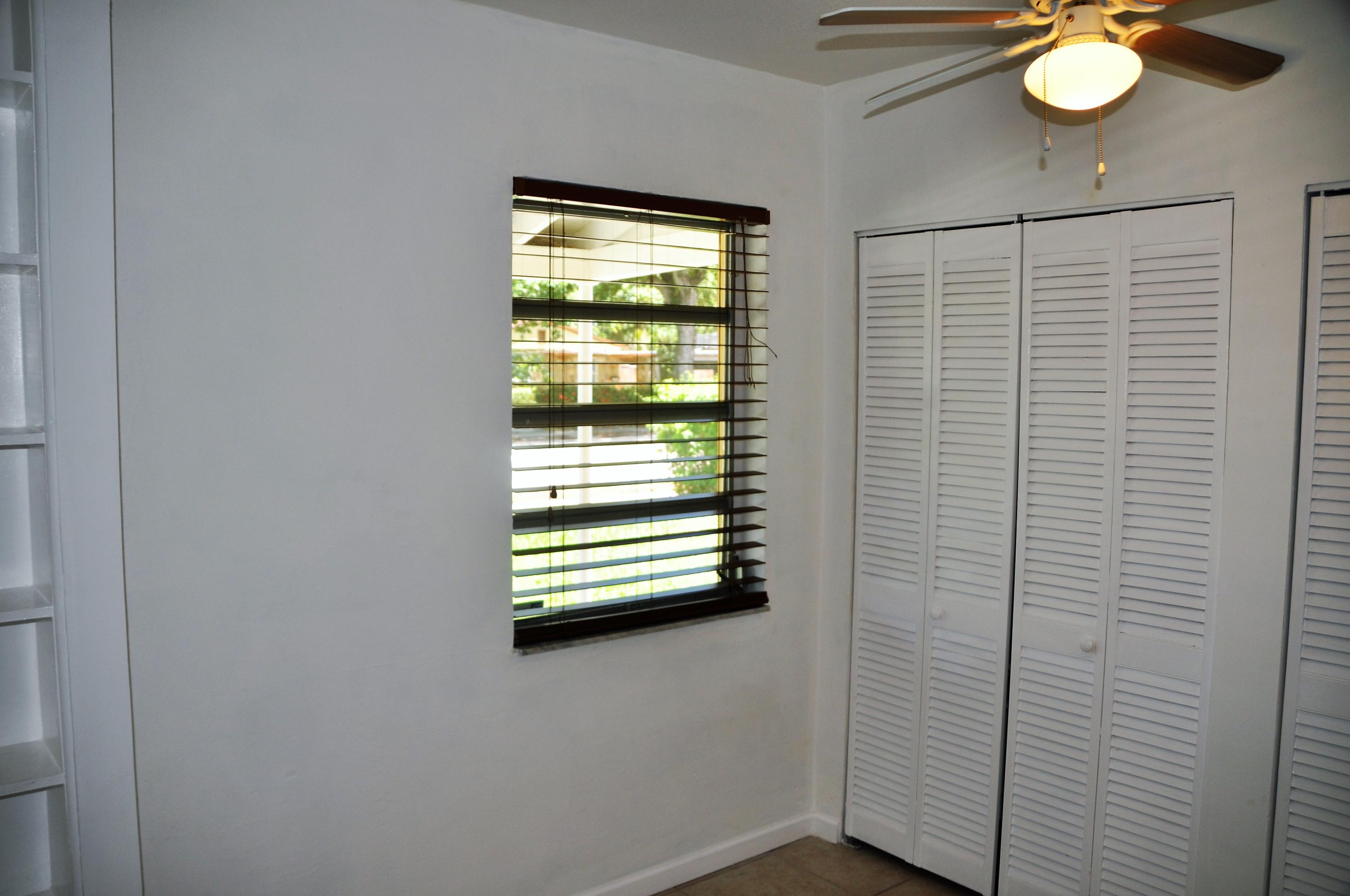 3025 Robert Road West Palm Beach, FL 33405 - Photo 34 of 41 a view of empty room with wooden floor