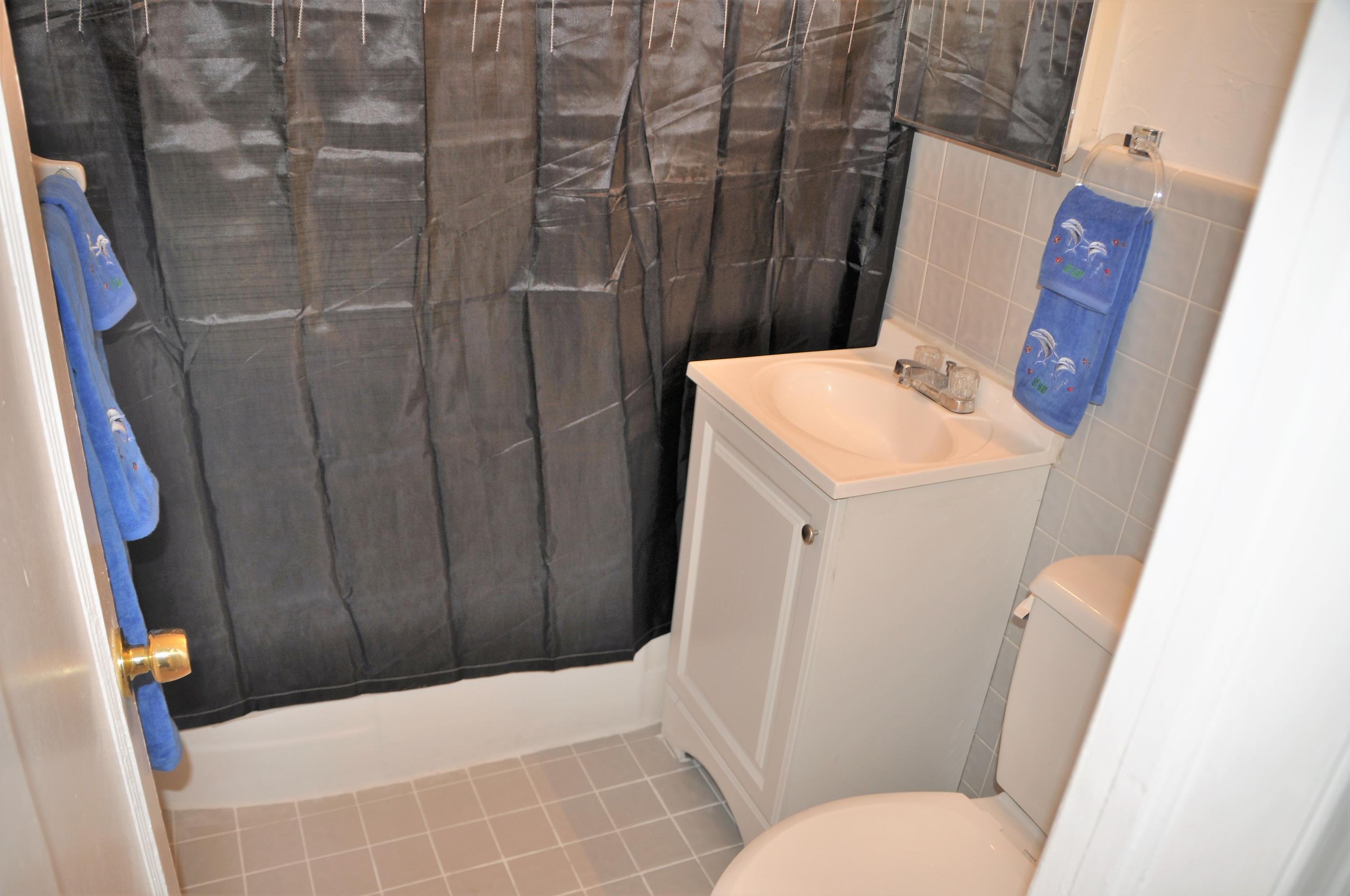 3025 Robert Road West Palm Beach, FL 33405 - Photo 38 of 41 a bathroom with a sink and toilet