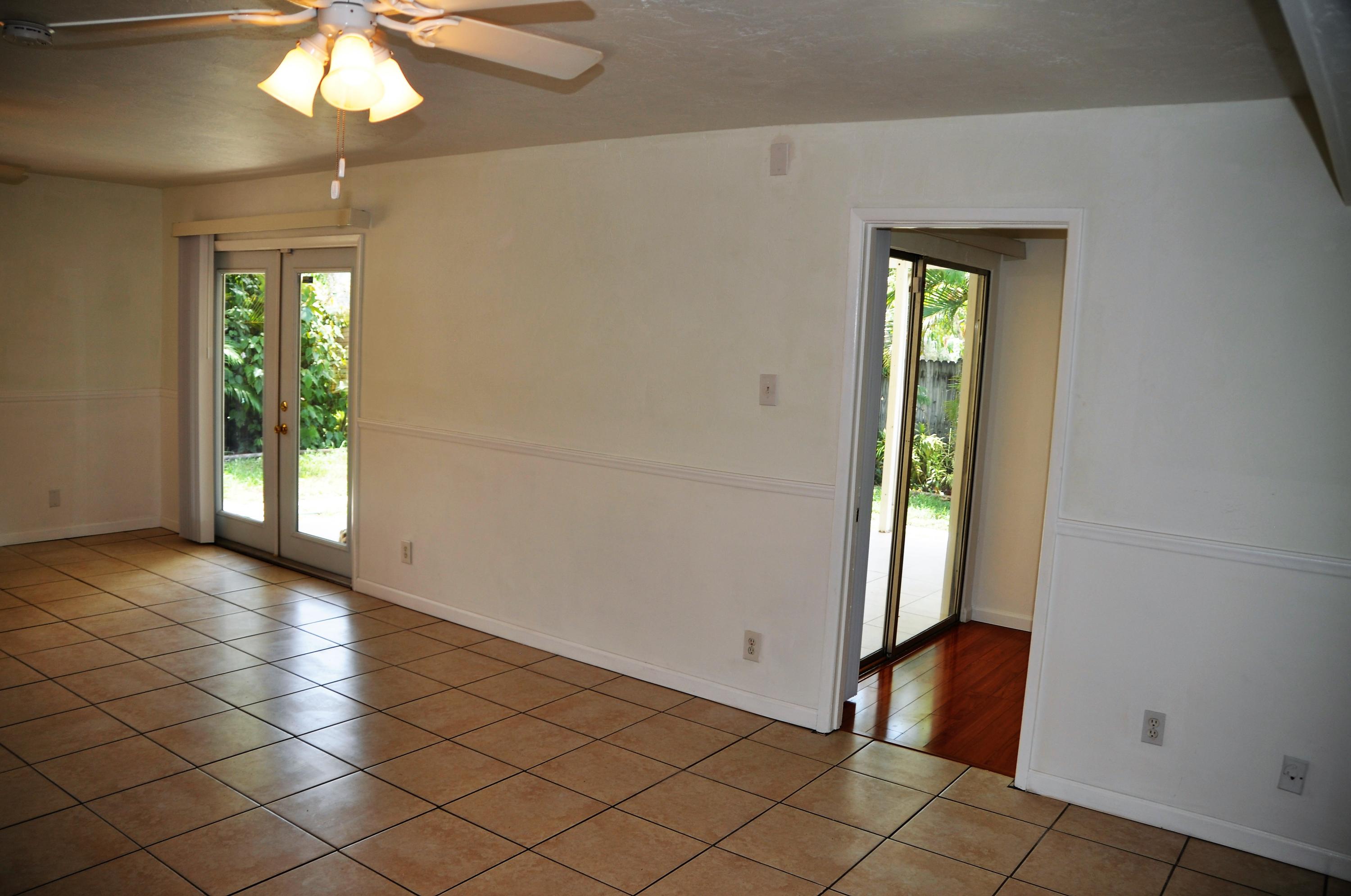 3025 Robert Road West Palm Beach, FL 33405 - Photo 9 of 41 an empty room with closet and windows