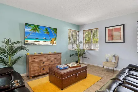 a living room with furniture and a couch