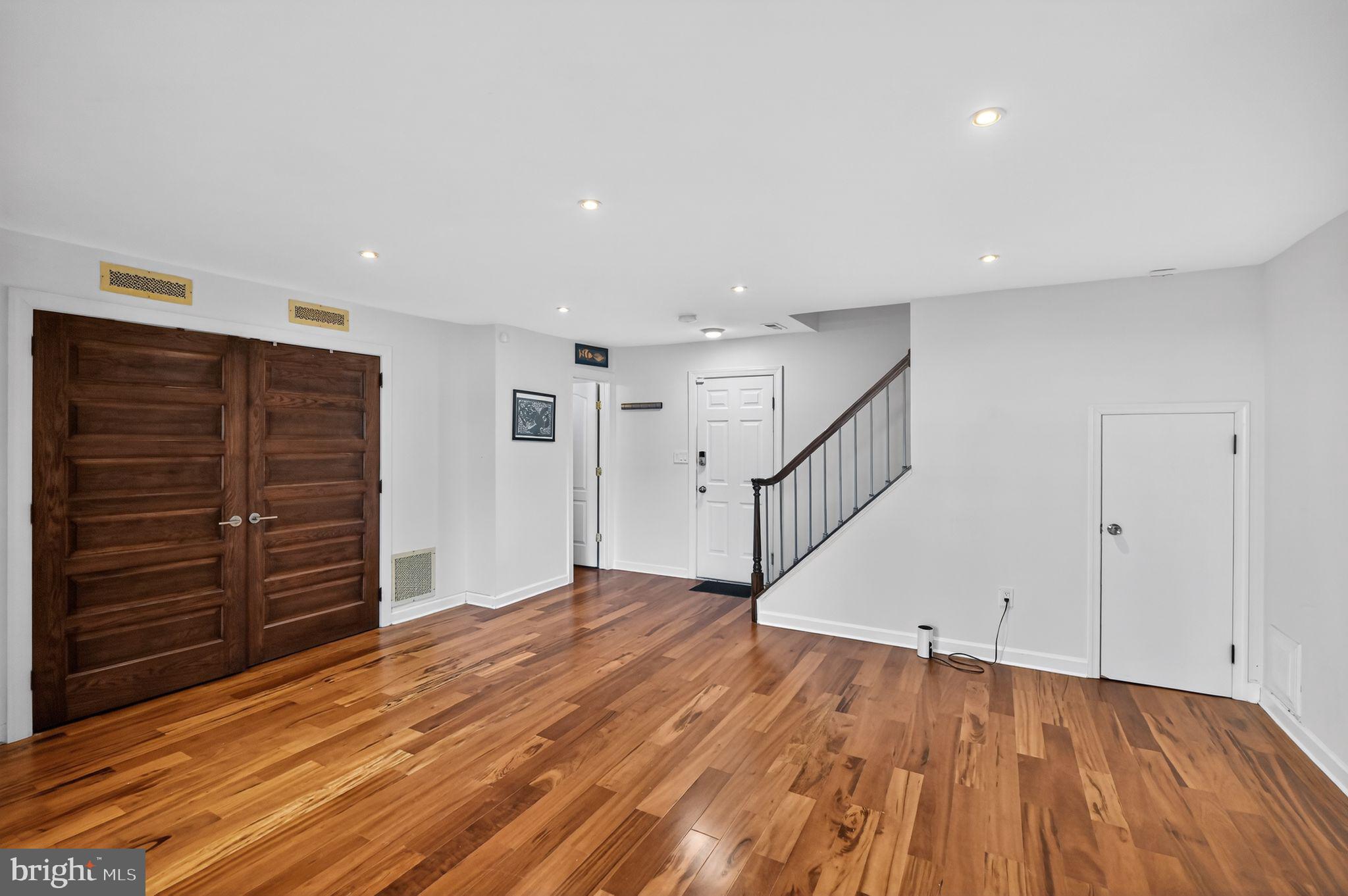 128 Rees Place Falls Church, VA 22046 - Photo 42 of 47 a view of an empty room with wooden floor and closet