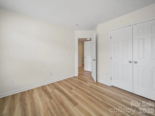 a swimming pool with outdoor seating and yard