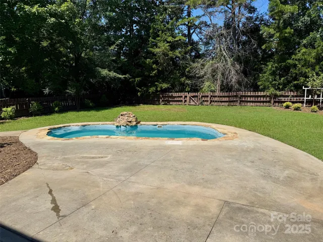 a view of a yard with an outdoor space