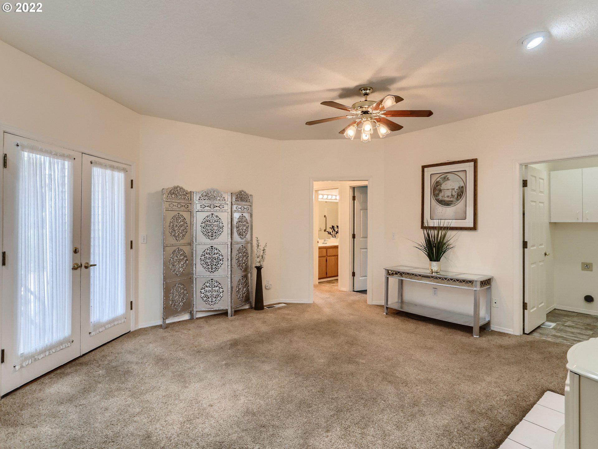 11370 Southwest Clifford Street Beaverton, OR 97008 - Photo 15 of 29 a living room with furniture and a chandelier