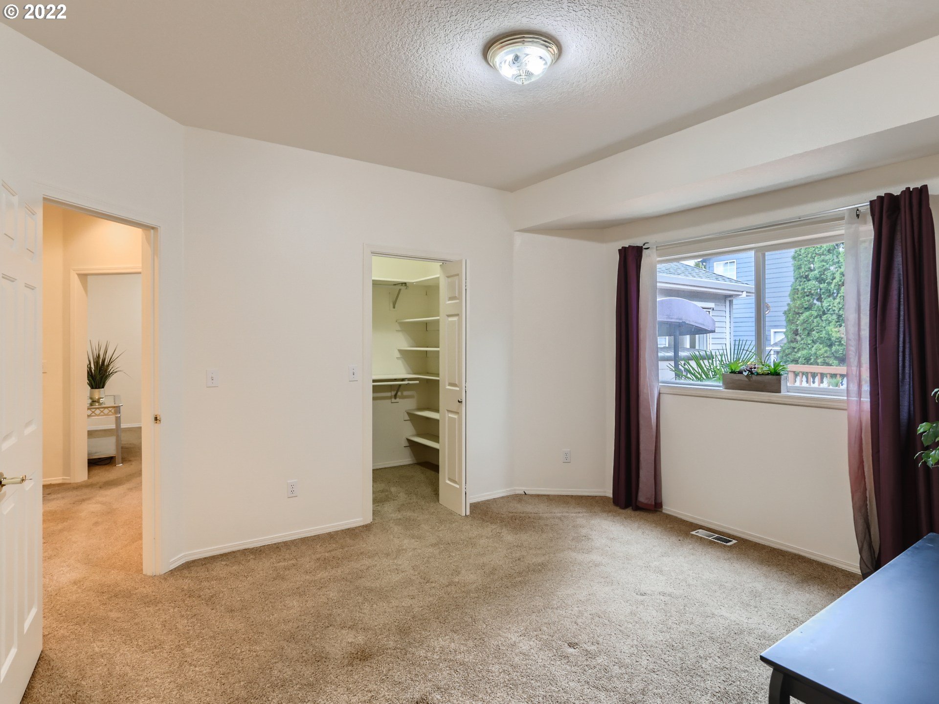 11370 Southwest Clifford Street Beaverton, OR 97008 - Photo 16 of 29 an empty room with windows and closet