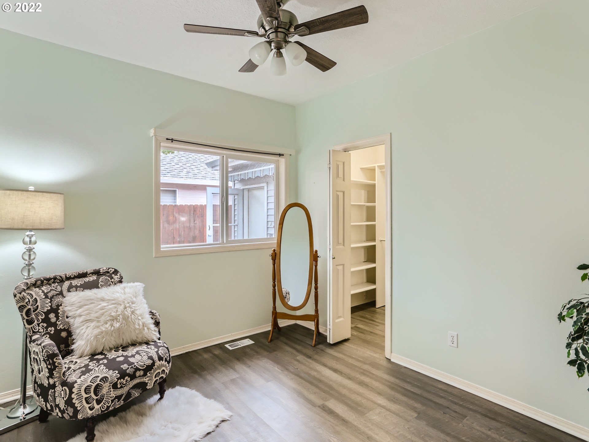 11370 Southwest Clifford Street Beaverton, OR 97008 - Photo 22 of 29 a bedroom with a bed and a window