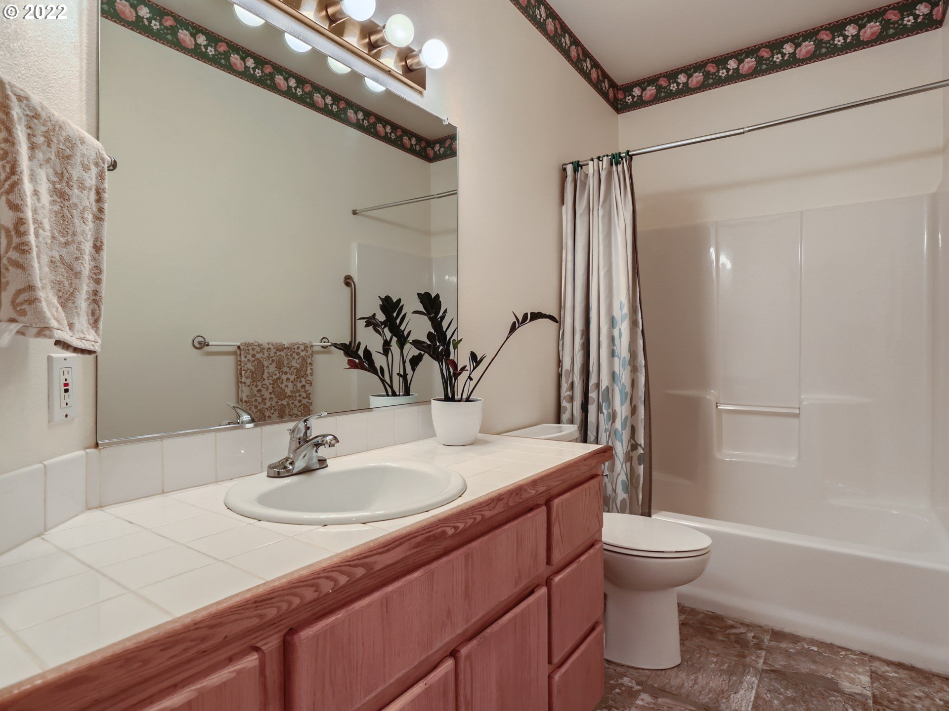 11370 Southwest Clifford Street Beaverton, OR 97008 - Photo 23 of 29 a bathroom with a sink a toilet and shower