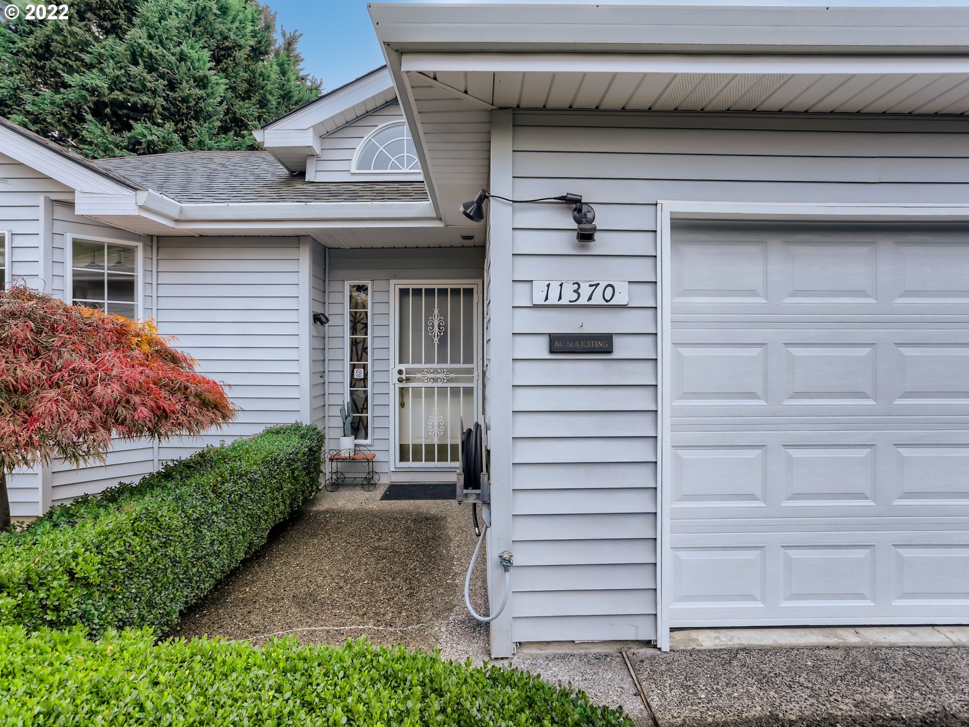 11370 Southwest Clifford Street Beaverton, OR 97008 - Photo 3 of 29 a view of a house with a small entryway