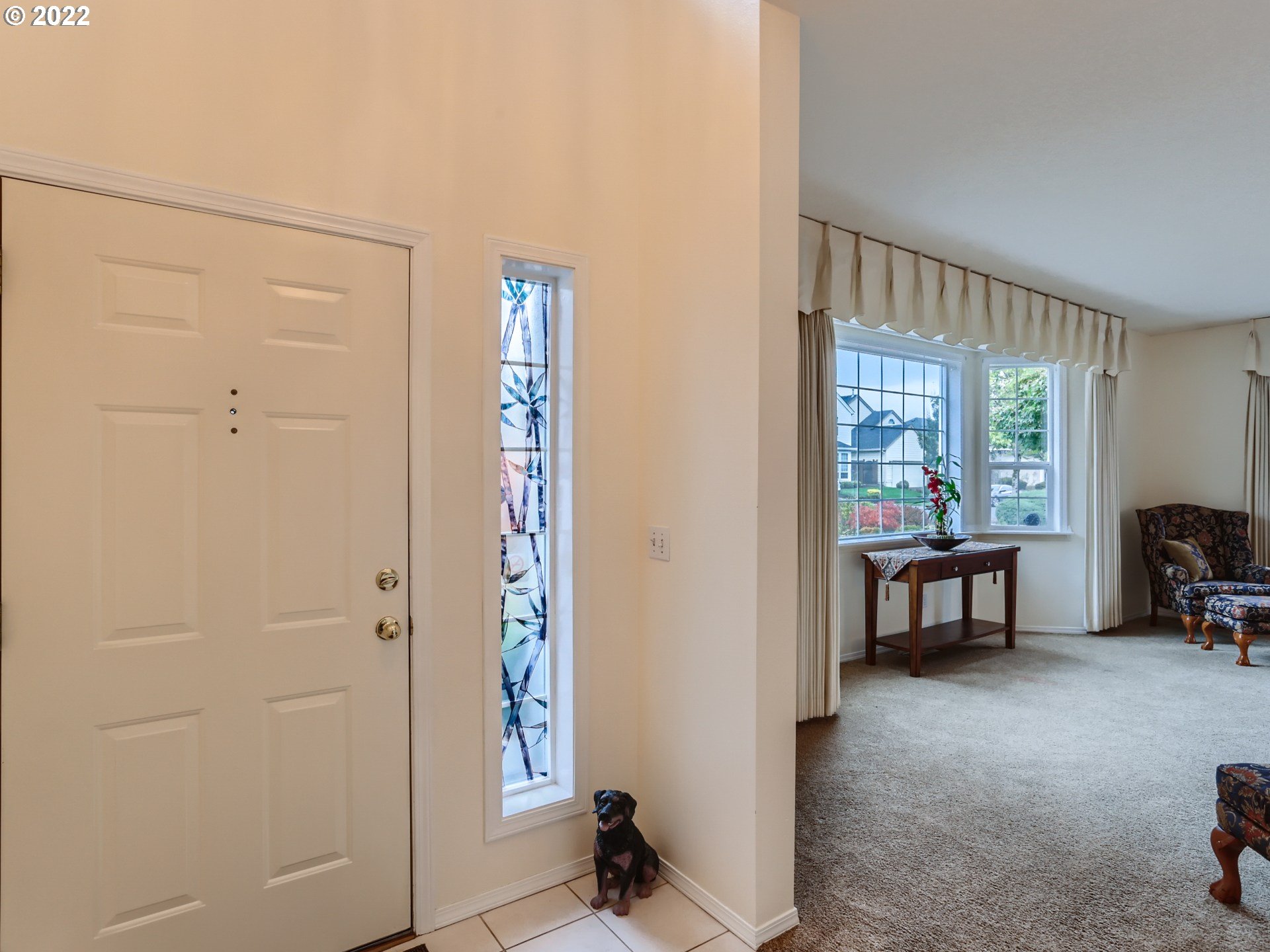 11370 Southwest Clifford Street Beaverton, OR 97008 - Photo 4 of 29 a view of livingroom with furniture and window