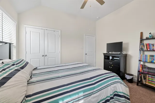 a front view of a house with outdoor seating