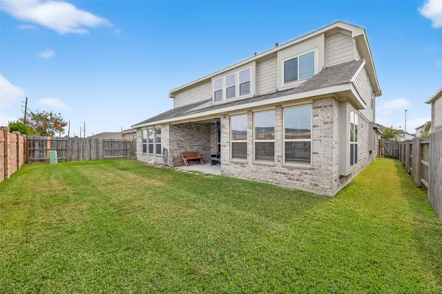 a view of a field with a big yard