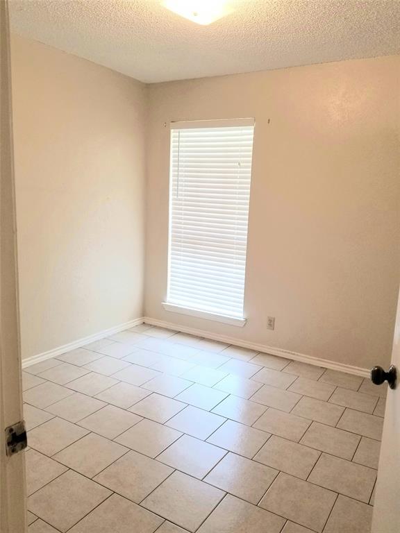 407 Gatewood Road, Unit 407 Garland, TX 75043 - Photo 6 of 6 Secondary bedroom