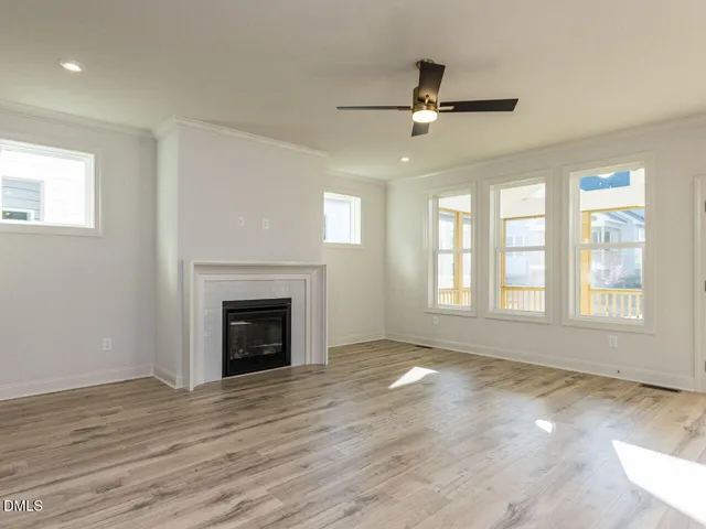 a view of an empty room and window