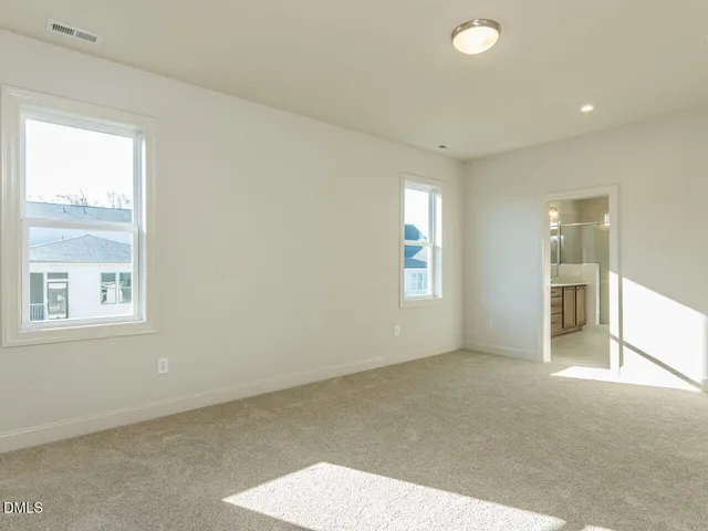 a bathroom with a granite countertop sink mirror and double