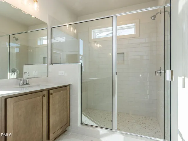 a view of a balcony with a floor to ceiling window