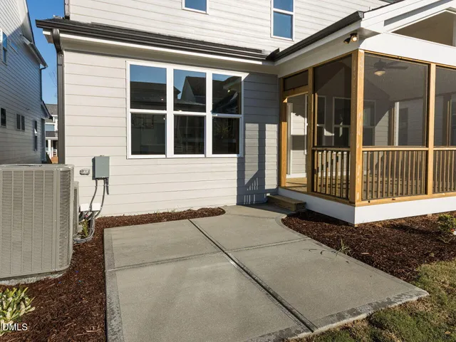 a view of a house with a back yard