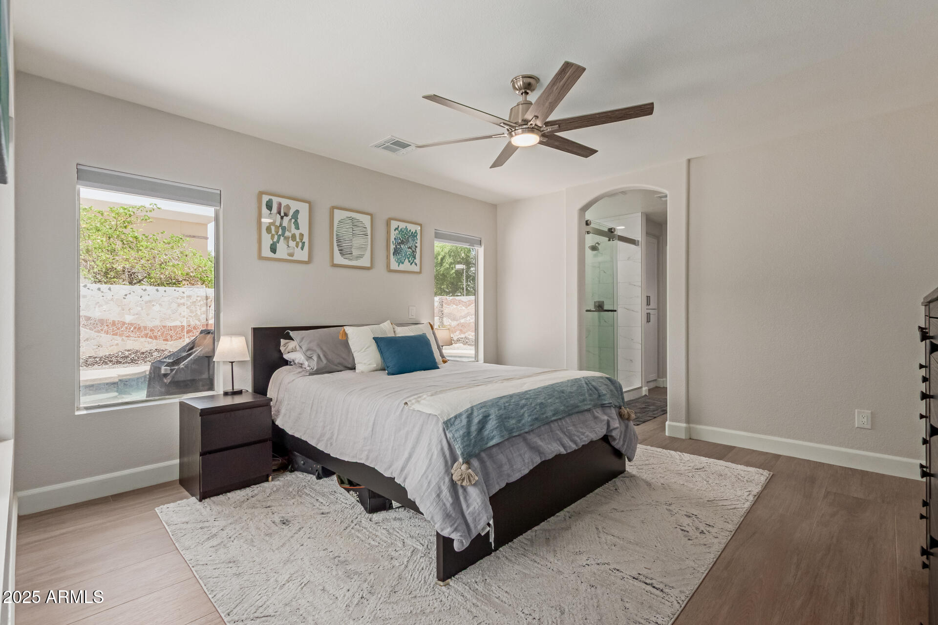 92 West Jasper Drive Gilbert, AZ 85233 - Photo 12 of 34 a bedroom with a large bed and a window