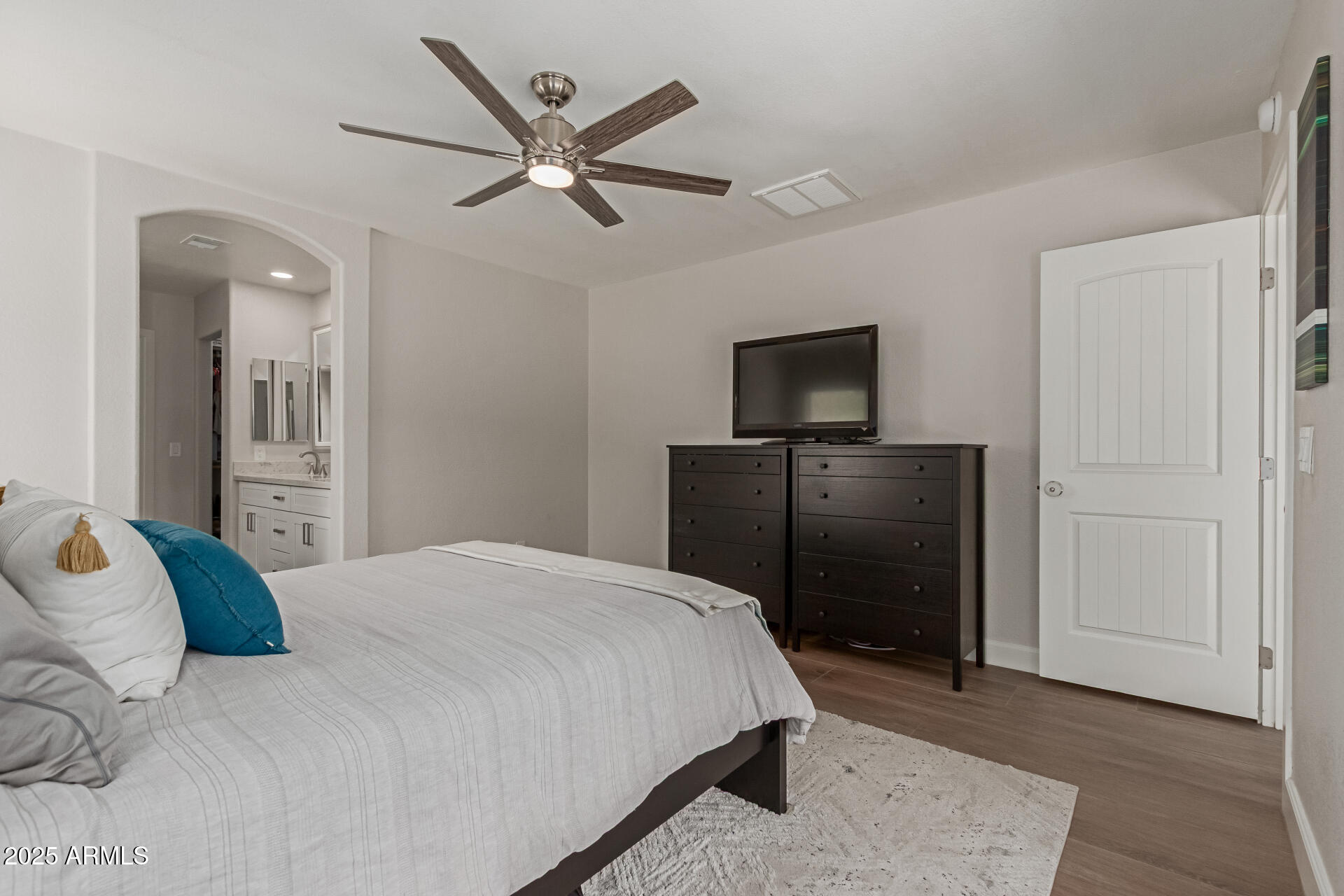 92 West Jasper Drive Gilbert, AZ 85233 - Photo 15 of 34 a bedroom with a bed and a television