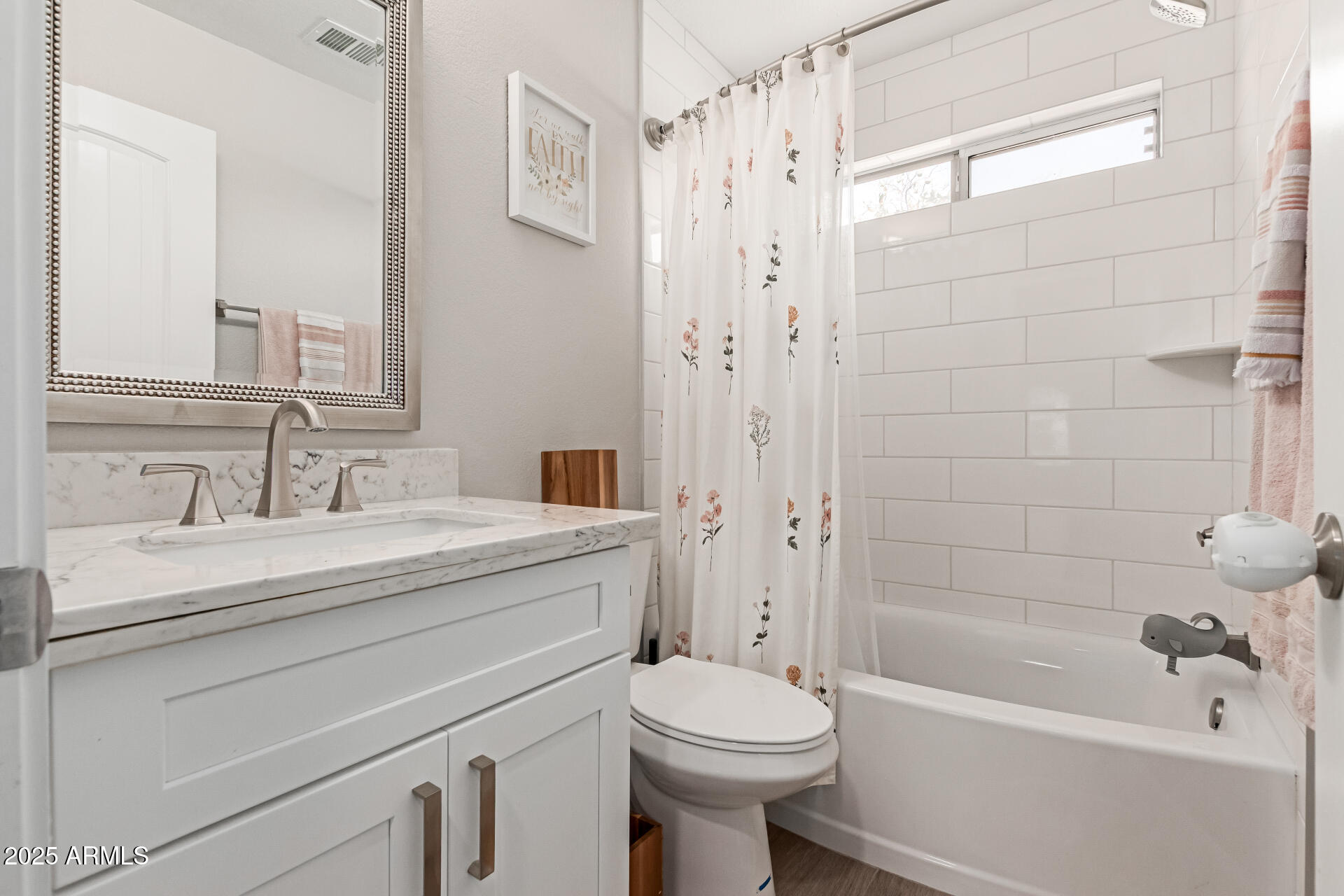 92 West Jasper Drive Gilbert, AZ 85233 - Photo 21 of 34 a bathroom with a granite countertop sink a toilet and shower