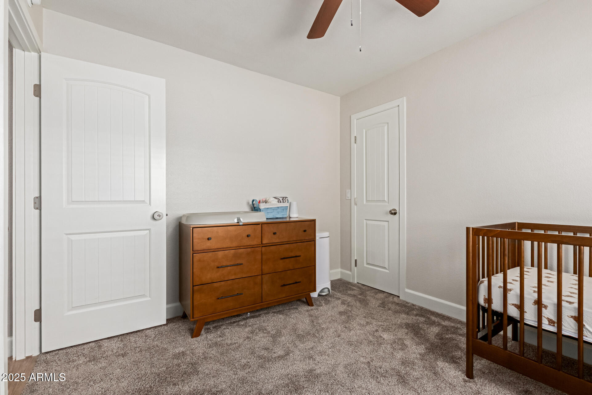 92 West Jasper Drive Gilbert, AZ 85233 - Photo 23 of 34 a room with a dresser and a window