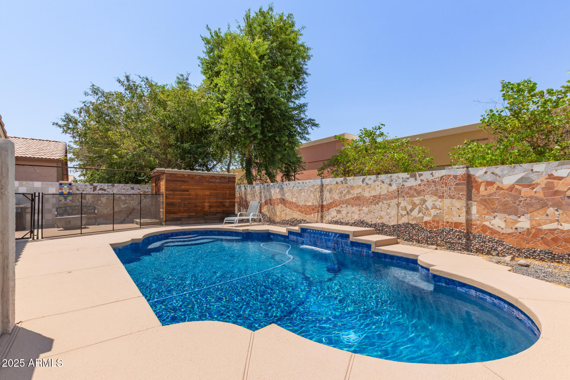92 West Jasper Drive Gilbert, AZ 85233 - Photo 28 of 34 a view of a swimming pool with a patio