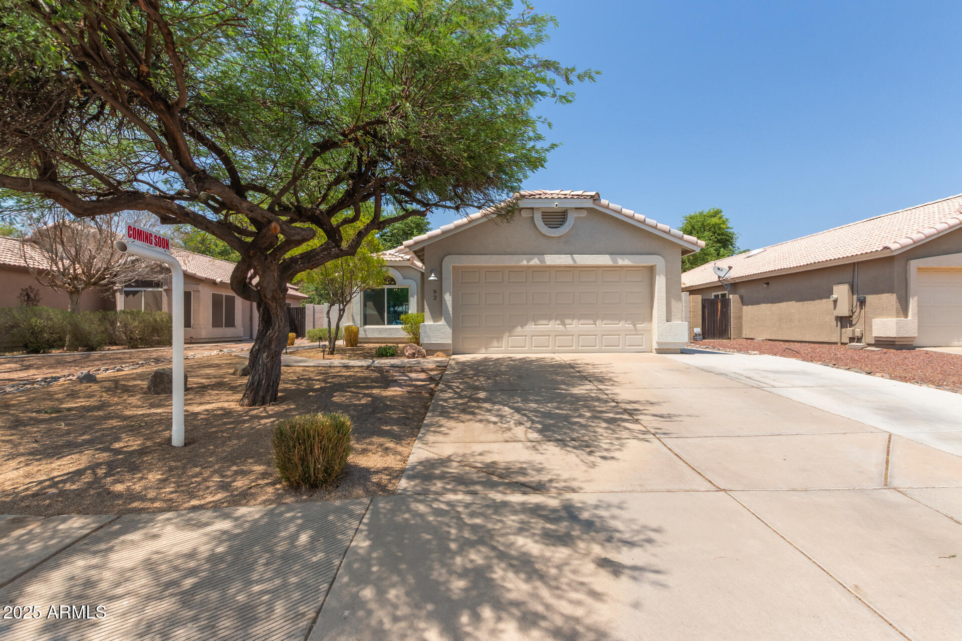 92 West Jasper Drive Gilbert, AZ 85233 - Photo 31 of 34 a front view of a house with a yard