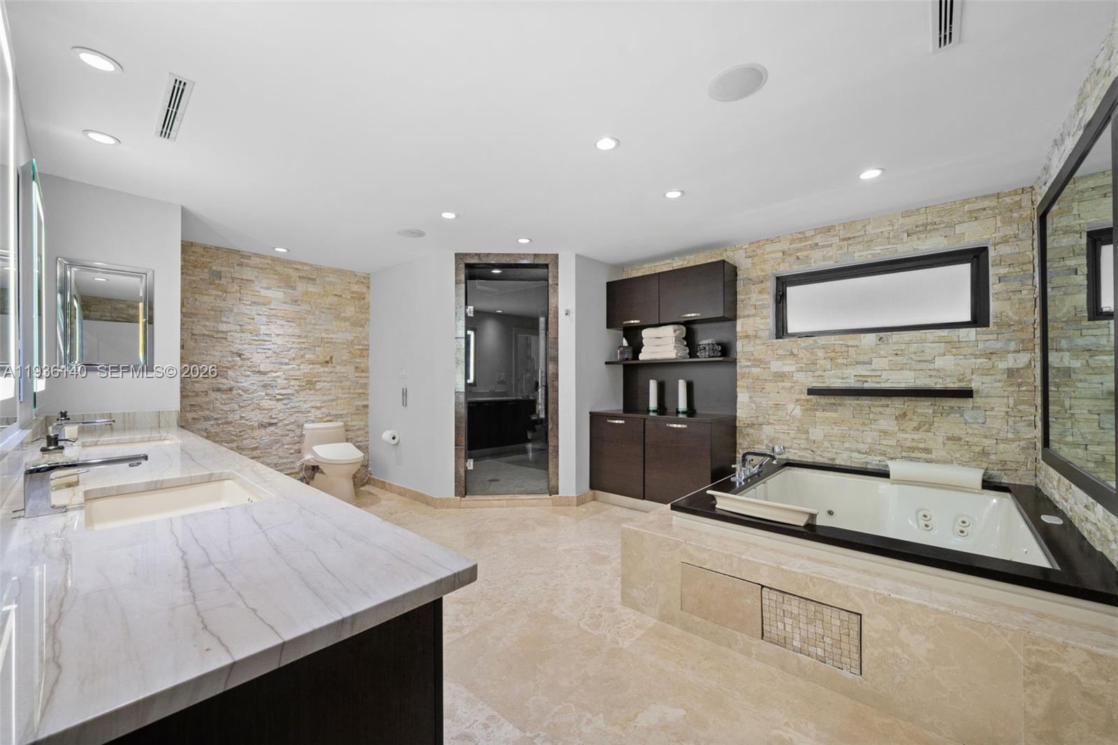 1251 Kane Concourse Bay Harbor Islands, FL 33154 - Photo 36 of 52 a kitchen with sink stove and refrigerator