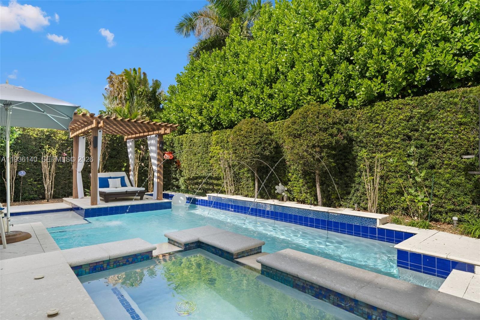 1251 Kane Concourse Bay Harbor Islands, FL 33154 - Photo 45 of 52 a view of swimming pool with patio