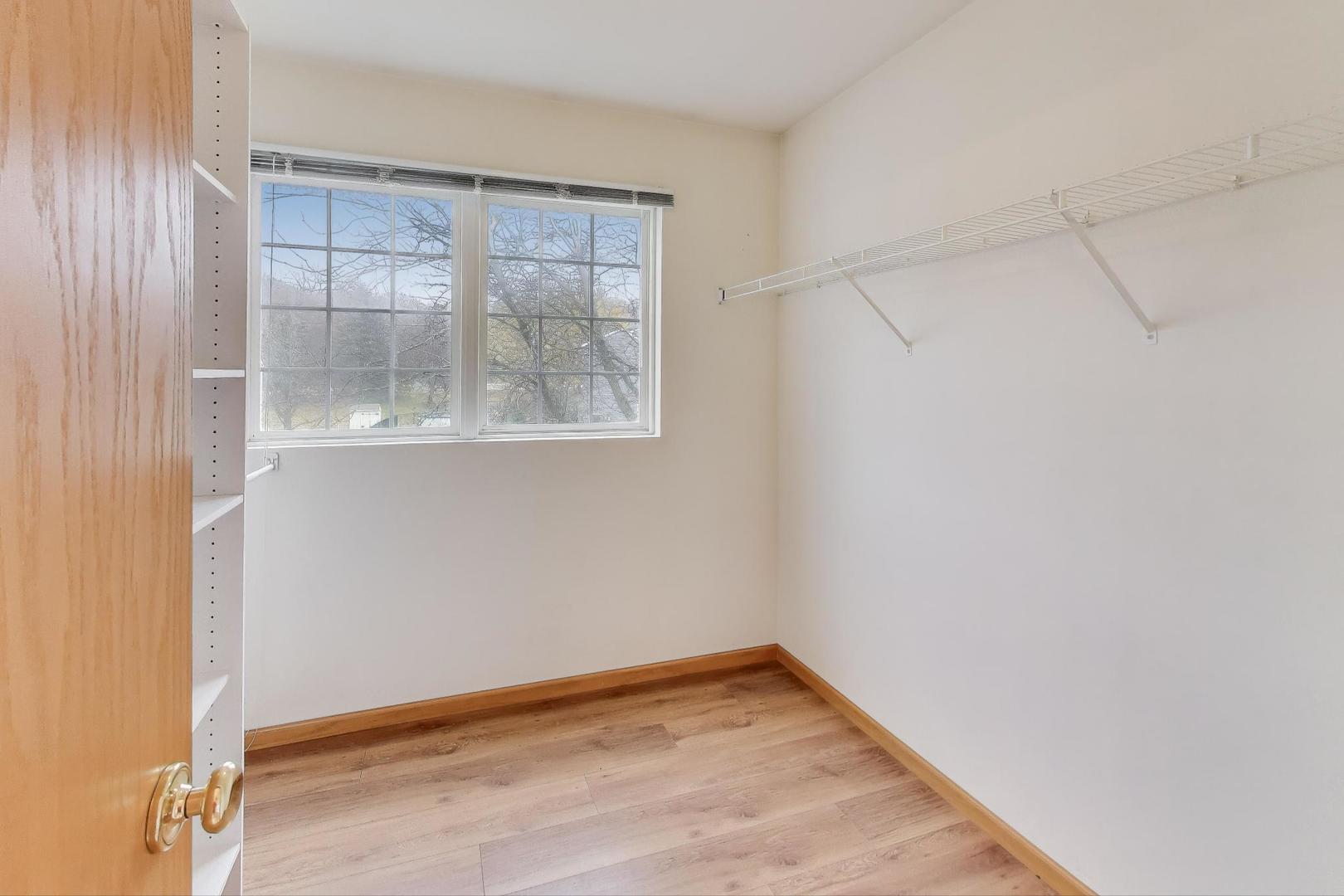 719 Sun Lake Road Lake Villa, IL 60046 - Photo 26 of 46 a view of empty room with wooden floor and fan