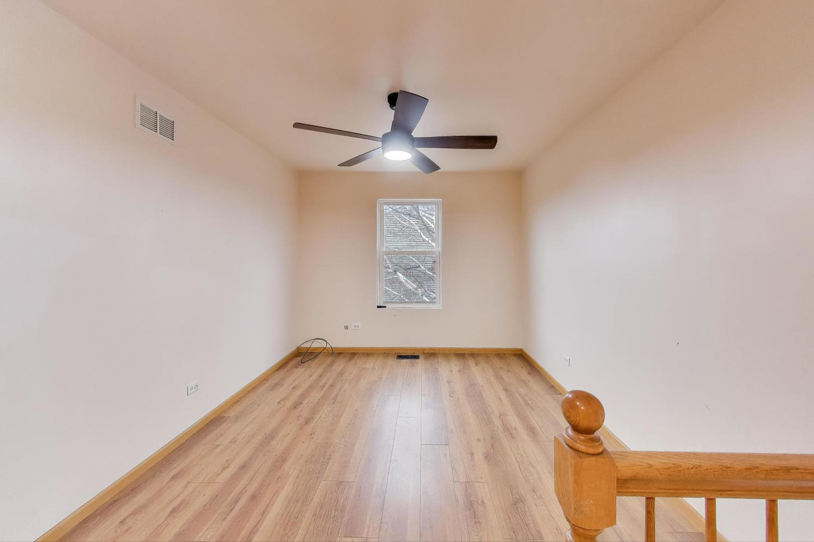 719 Sun Lake Road Lake Villa, IL 60046 - Photo 30 of 46 a view of empty room with wooden floor