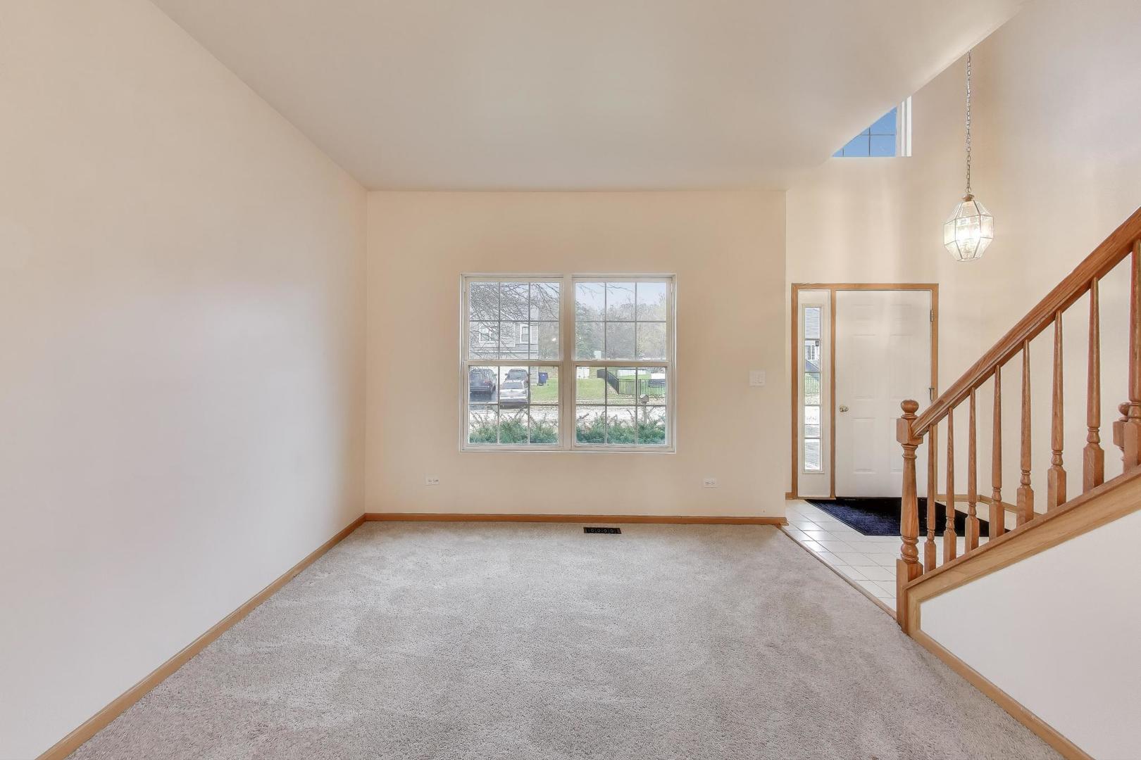 719 Sun Lake Road Lake Villa, IL 60046 - Photo 3 of 46 a view of an empty room with a window