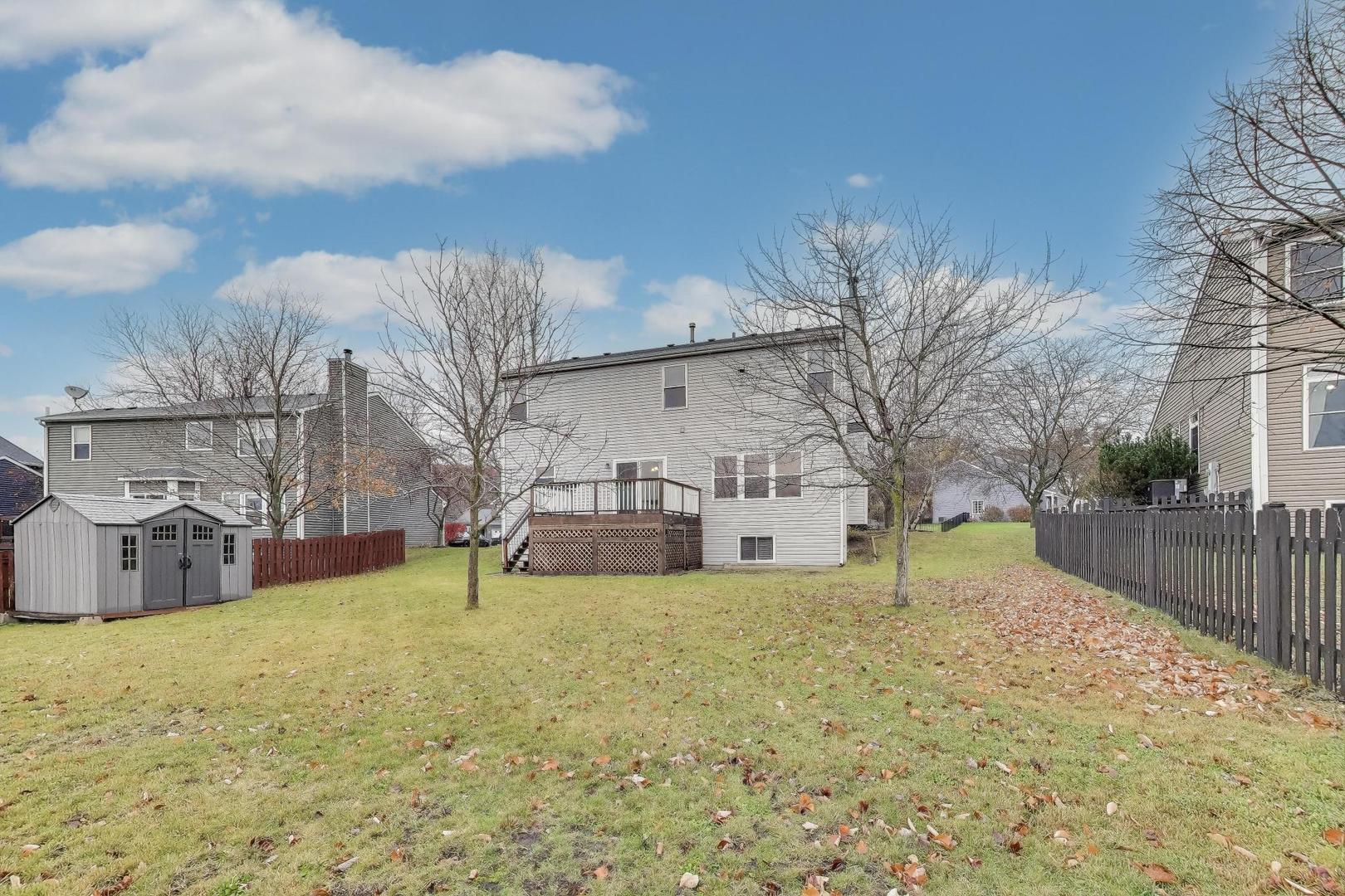 719 Sun Lake Road Lake Villa, IL 60046 - Photo 41 of 46 a view of a house with a yard