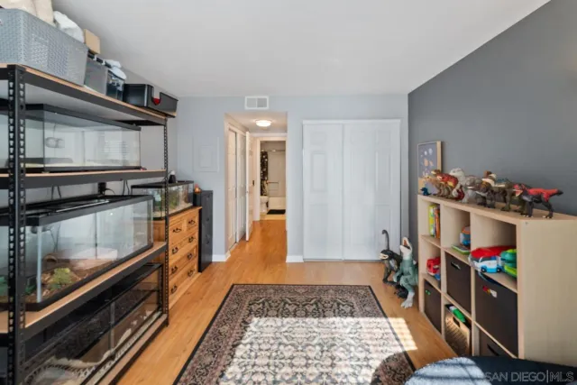 a room with furniture and a wooden floor