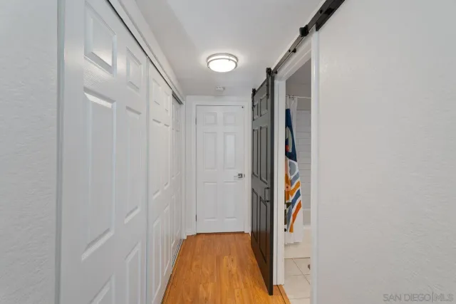 a view of a hallway view with staircase