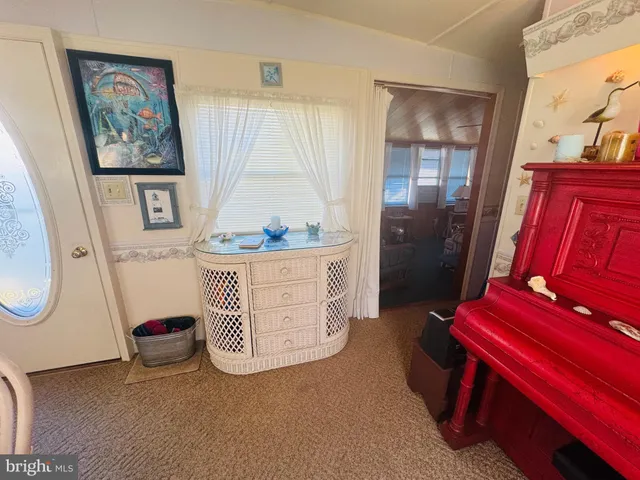 a room with furniture and window